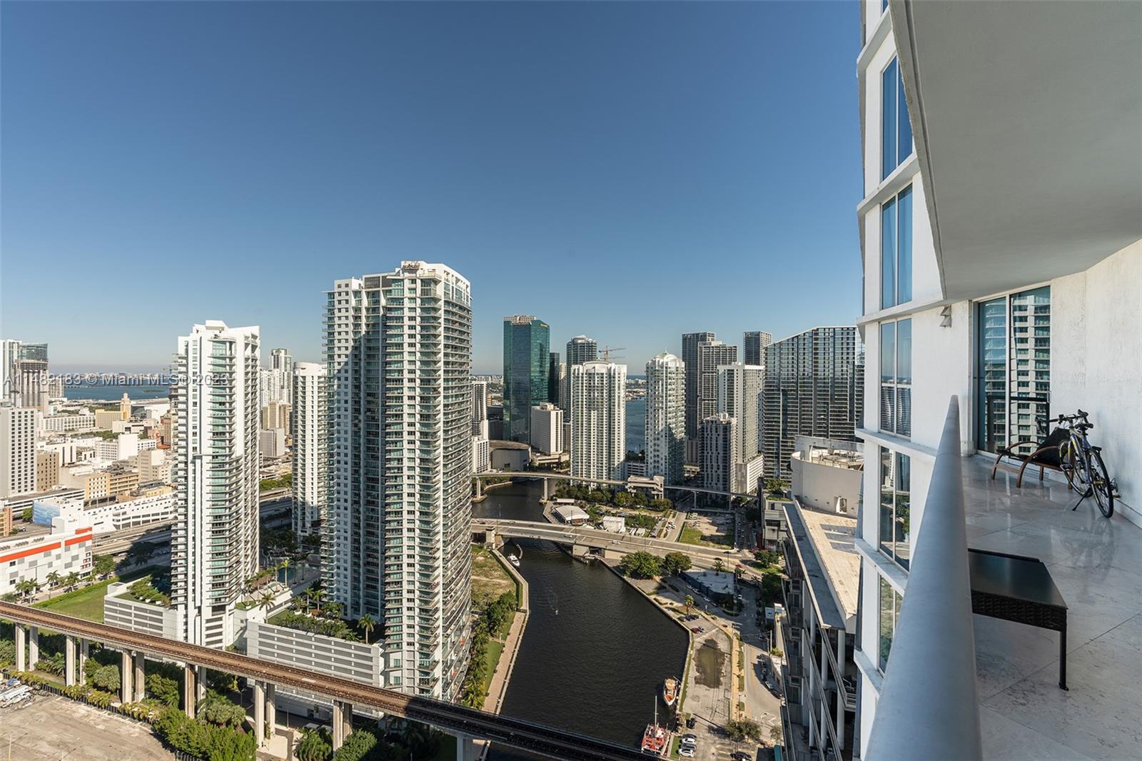 Panoramic Views from this SKY HOME located in the renovated LATITUDE ON THE RIVER, 2 Bedroom 2.5 Bath residence in mint condition, with porcelain floors throughout, new lightning fixtures, shades, california closets, upgraded bathrooms. NEW A/C. Assigned parking space. Great amenities, centrally located in the Financial District, walking distance to the UNDERLINE, BRICKELL CITY CENTRE, METRORAIL and all the entertainment that Brickell offers. (Pool still under renovations).