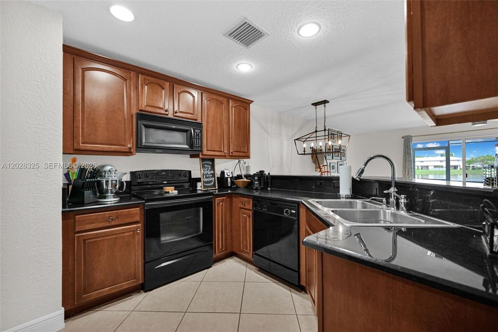 Photo of 5927 Royal Way, Tamarac, FL 33321 (MLS # A12028325)