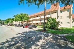 Photo of 8081 N Sunrise Lakes Dr #110, Sunrise, FL 33322 (MLS # A12070221)