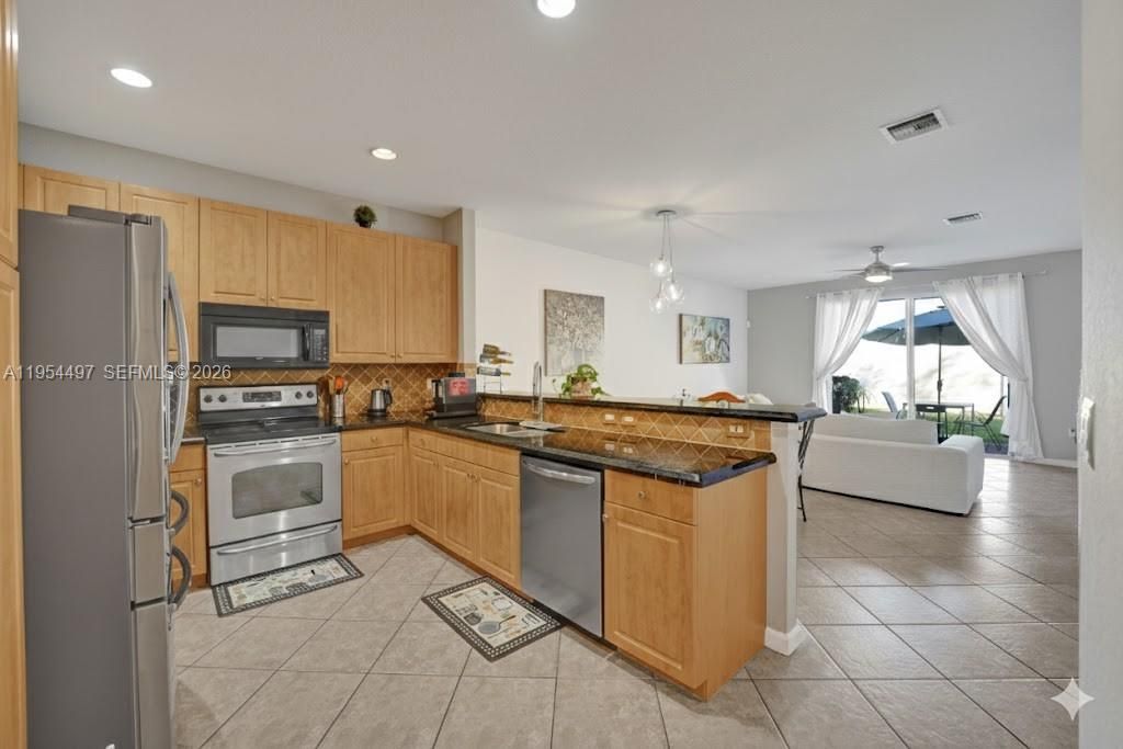 Photo of 7717 Paddock Pl, Davie, FL 33328 (MLS # A11954497)