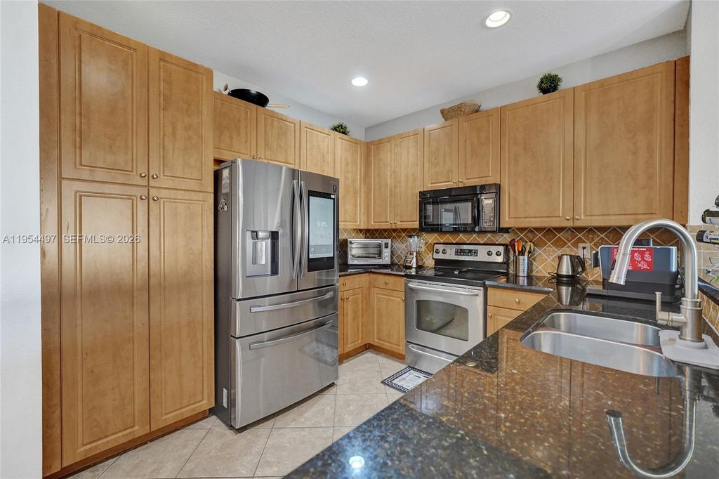 Photo of 7717 Paddock Pl, Davie, FL 33328 (MLS # A11954497)