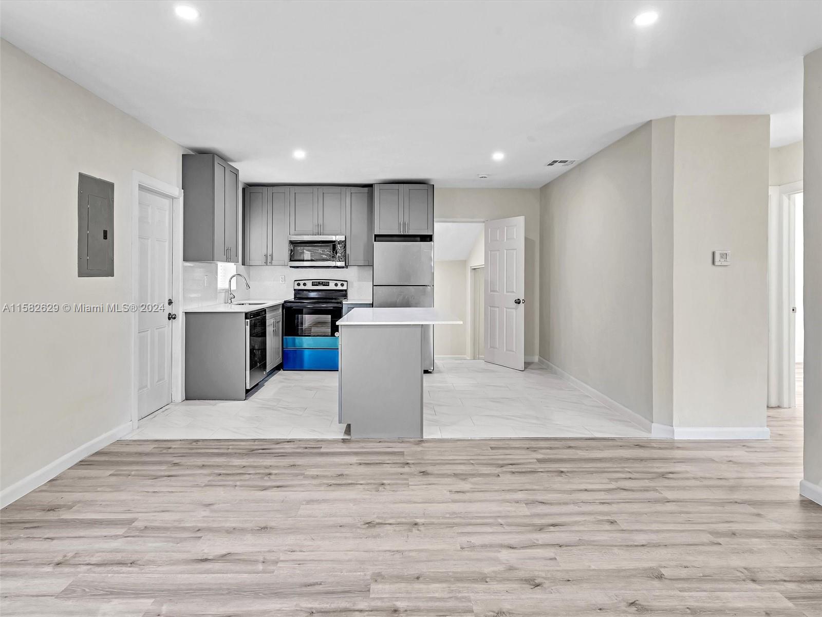 Step into this beautifully renovated home where modern elegance meets classic charm. Enjoy the open-concept living space with tile floors and a brand new kitchen featuring granite countertops and stainless steel appliances. Retreat to the luxurious master suite with a spa-like ensuite, offering a perfect blend of comfort and style in a desirable neighborhood. A short distance from Design District, Downtown, Brickell & Miami Beach.