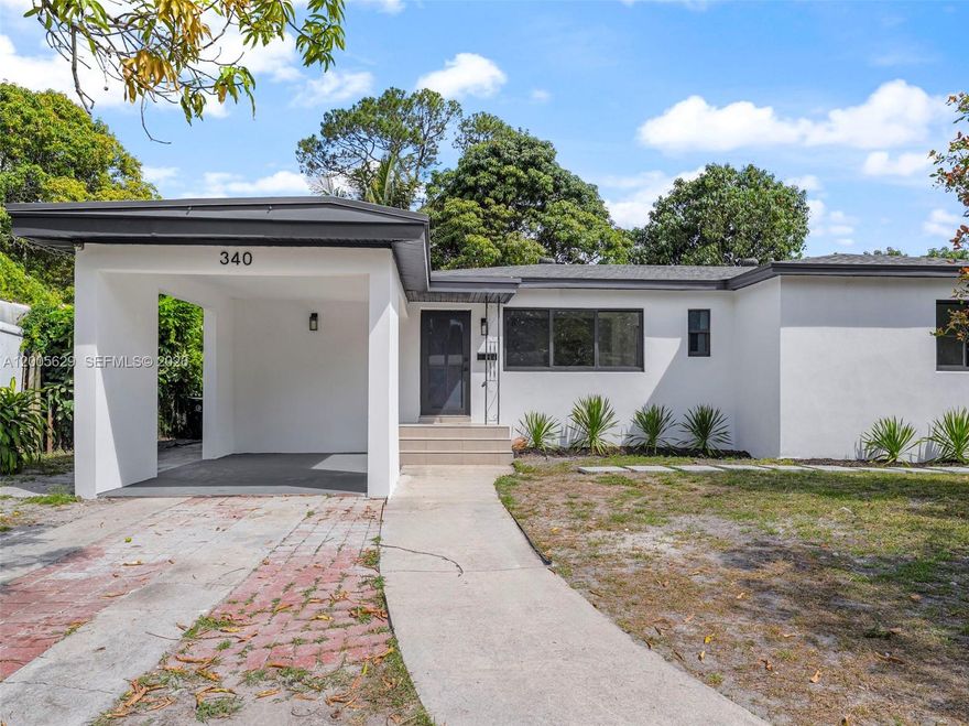 Just renovated and move in ready. This 5 bedroom 3 bathroom stunner has it ALL - brand new everything! From chef's kitchen with a statement hood, new stainless steel appliances, shaker cabinets to the sleek porcelain-tiled bathrooms and flooring throughout. New plumbing, electrical and stylish arches. Featuring a separate laundry and pantry room with custom cabinetry, white quartz countertops and stackable LG wash tower. Enjoy low insurance with a new roof and impact windows and doors. Interior and exterior were painted designer Benjamin Moore colors. Step outside to a spacious backyard on a great lot with numerous fruit trees. The property also includes a private in law suite with its own bedroom and bathroom, featuring tall ceilings and a separate feel-perfect for extended family, guests or additional income. Schedule your showing now.