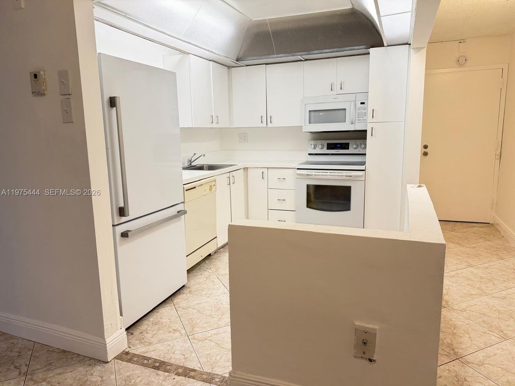 Photo of 4304 NW 9th Ave #2-1C, Deerfield Beach, FL 33064 (MLS # A11975444)