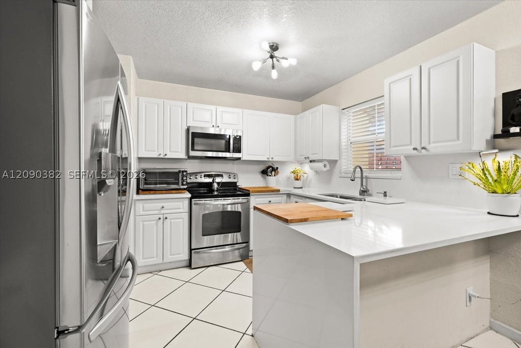 Photo of 195 Sable Palm Way, Davie, FL 33325 (MLS # A12090382)