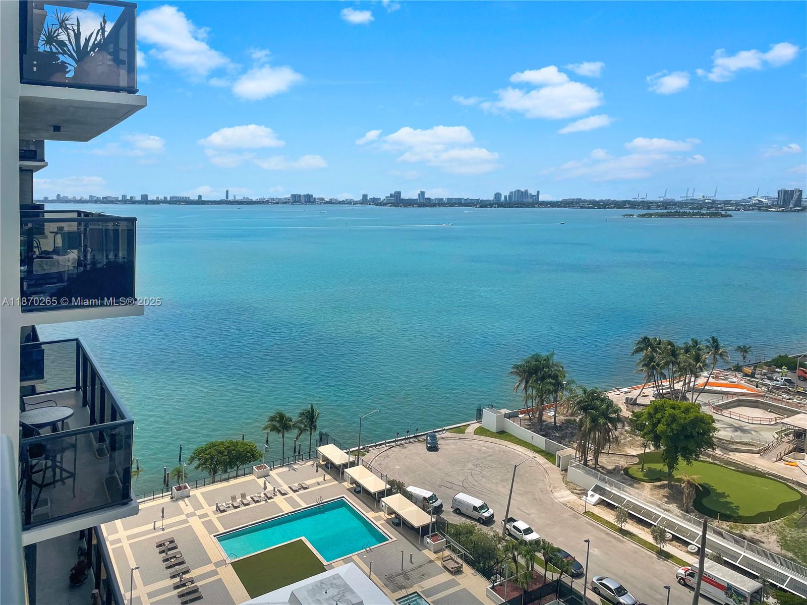 Midtown Waterfront building! Remodeled, spacious and bright, 2 bedrooms, 2 bathrooms apartment with plenty of storage. Enjoy water views from living room, balcony, and bedrooms. Washer and dryer inside unit. Basic cable and fiber internet included. Pre-wired and 6.1 surround sound ready living room. Covered assigned parking and plenty of guest parking as well. Great amenities: Waterfront pool, jacuzzi, tennis and handball courts, basketball court, BBQ, exercise room, business center, 24 hours lobby attendant, and so much more. All within the building you will find a mini market, salon, tailor, and others. This building has it all from location to amenities to convenience. Just minutes from the beach, airport, restaurants and shops.