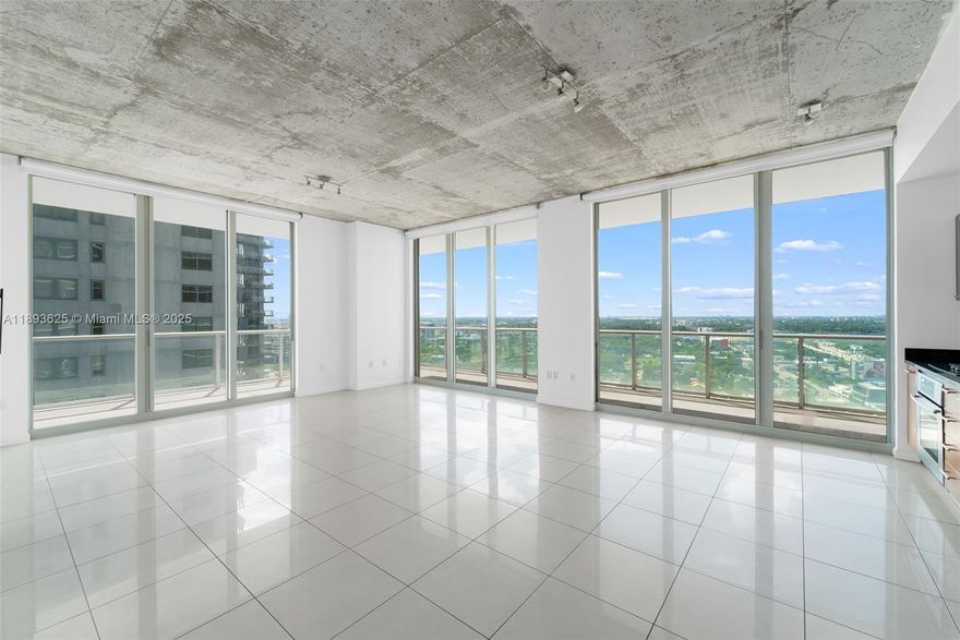 Modern 2BD/2BA with wraparound terrace and bay views on the 25th floor of 2Midtown. This sleek residence features 10-ft ceilings, an open layout, stainless steel kitchen, renovated master bath, spacious closets, remote controlled shades,  in-unit washer/dryer, and one assigned parking space. Enjoy 569 sq. ft. of wraparound terrace with panoramic city and Biscayne Bay views.

Residents experience full-service luxury living with concierge, doorman, and roving security. The 7th-floor amenity deck includes a resort-style pool, three plunge pools, hot tub, fitness center, steam room, sauna, kids’ playground, and outdoor lounge with fireside kitchen.

Located where Wynwood meets the Miami Design District, steps from Miami’s top restaurants, boutiques, arts and culture.