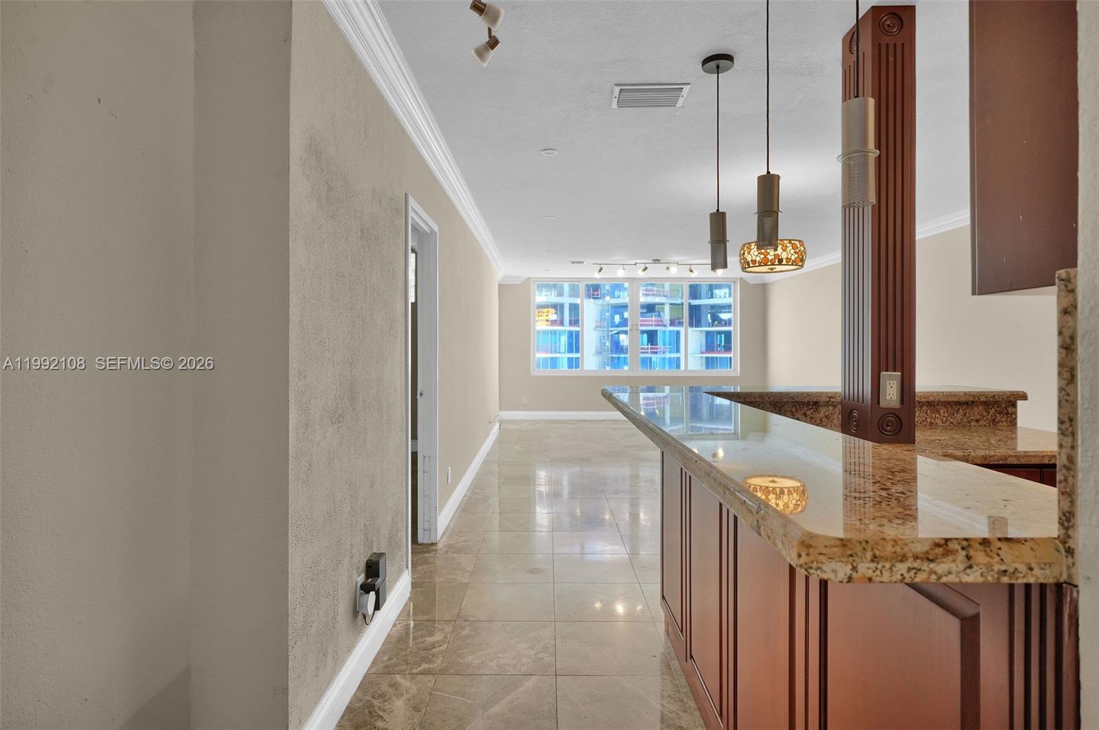 THE CARRIAGE HOUSE CONDO - Residential