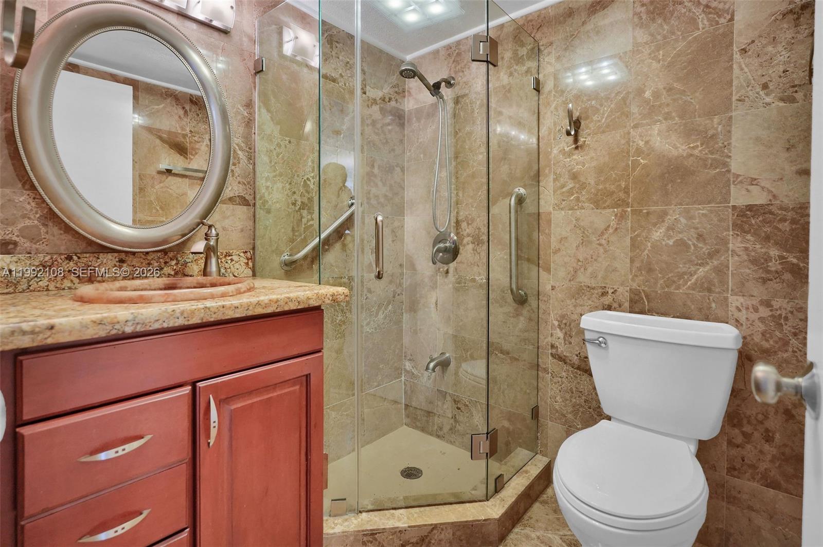 THE CARRIAGE HOUSE CONDO - Residential