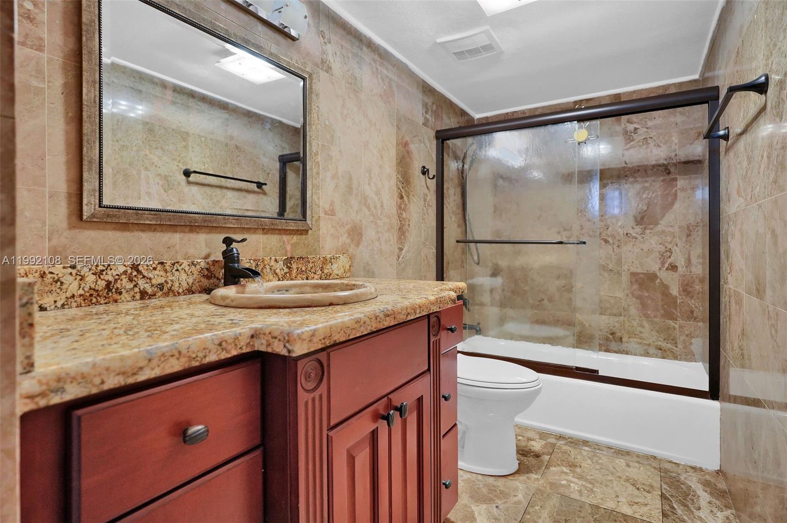 THE CARRIAGE HOUSE CONDO - Residential
