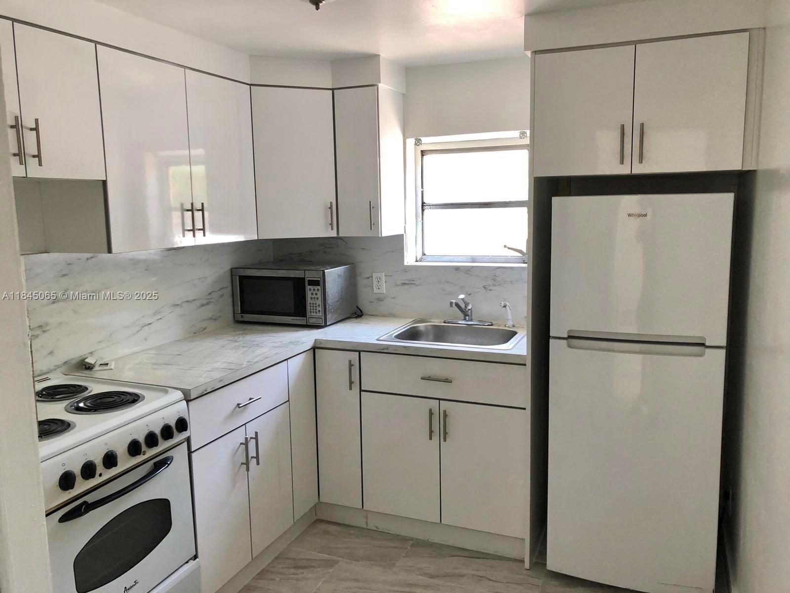 Fast approval ,Renovated 1 bedroom, new kitchen, tile floor, shared washer and dryer. East of US-1 very quiet and secured area. 10 minutes to the beach. water and electricity included.