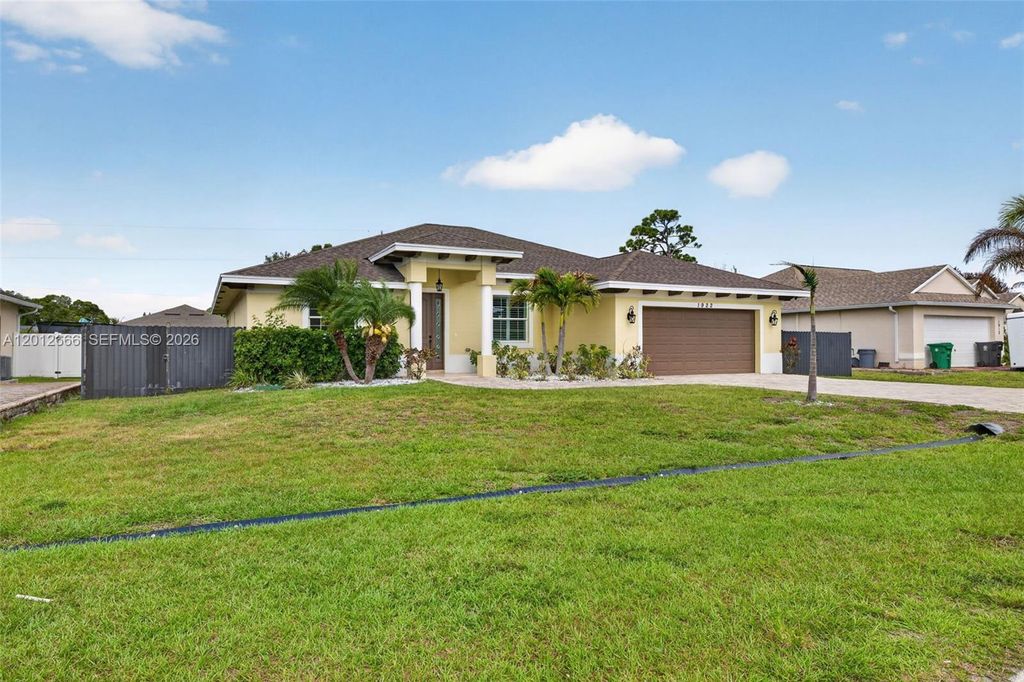 Photo of 1922 SE Camilo St, Port St Lucie, FL 34952 (MLS # A12012666)