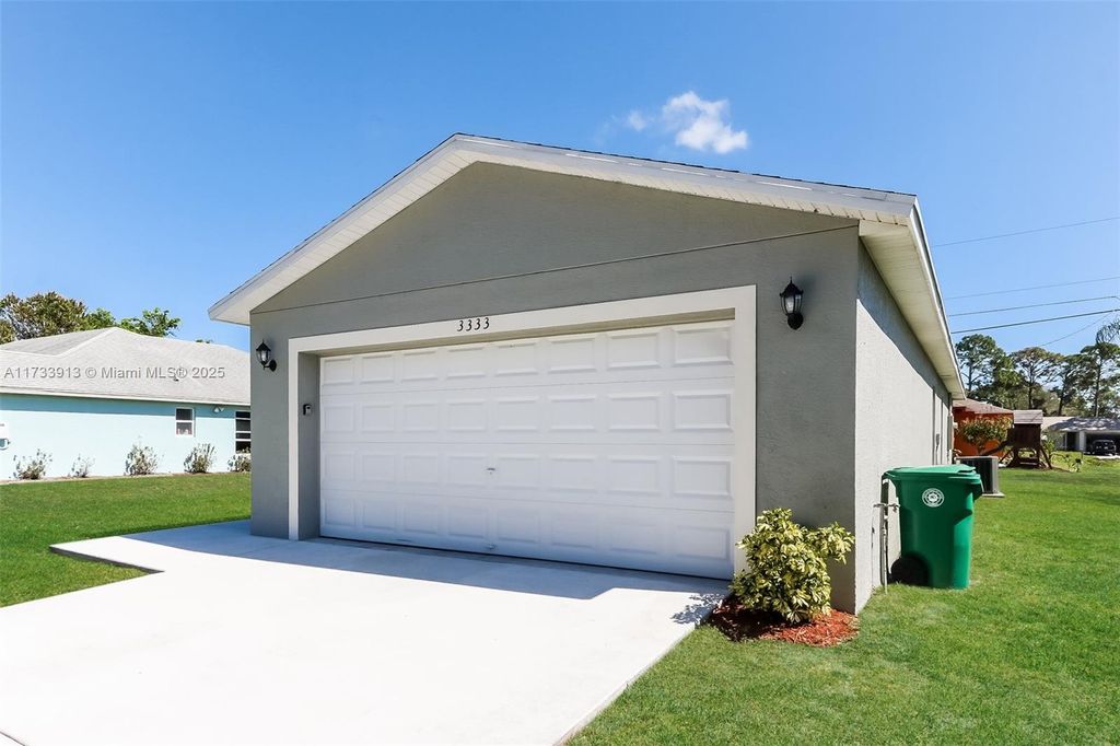 Photo of 3333 SW Potts St, Port Saint Lucie, FL 34953 (MLS # A11733913)