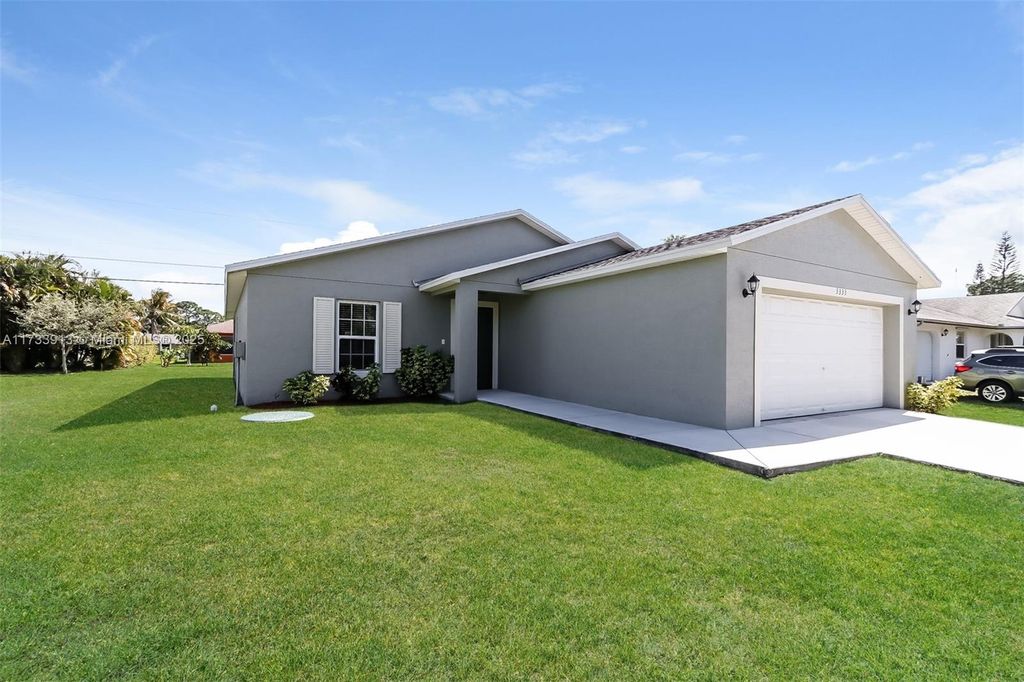 Photo of 3333 SW Potts St, Port Saint Lucie, FL 34953 (MLS # A11733913)