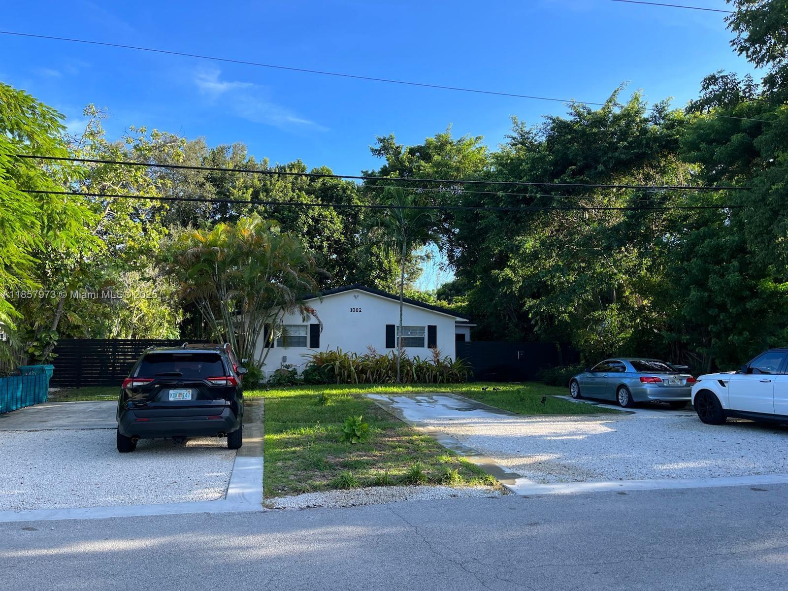 Welcome to bird sanctuary in the heart of Biscayne Park—a quiet, tree-lined neighborhood known for its lush greenery, charming homes, and tight-knit community feel. This beautifully updated 2/2 sits on a lot surrounded by mature trees and tropical landscaping. Just minutes from beautiful beaches, Aventura Mall and Wynwood this home offers the perfect balance of peaceful suburban living and city convenience. Kitchen and bathrooms have been updated for you to enjoy your new home at its best. House is being remodeled for you.
Kitchen and bathrooms have been updated for you to enjoy your new home at its best.