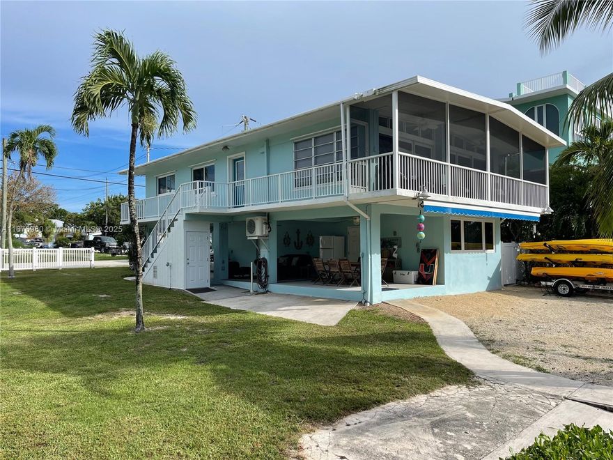 Escape the cold and enjoy your tropical retreat in this beautifully furnished 3 bed, 2 bath home in serene Buttonwood Bay! Located in a quiet residential neighborhood on a spacious double lot, this turnkey home is ideal for seasonal stays. Enjoy effortless water access with a boat dock & boat ramp, perfect for jet skis, kayaks, and paddle-boards.  Nestled bayside with quick access to the ocean, your days can be as adventurous or relaxing as you like. Watch the manatees glide by, or unwind while soaking in the beauty of the surrounding nature. You're just minutes from charming restaurants, unique shops, and local entertainment—all the best the Keys has to offer! Just pack your suitcase and start living the Keys lifestyle. Available now for seasonal rental or the ultimate snowbird getaway.