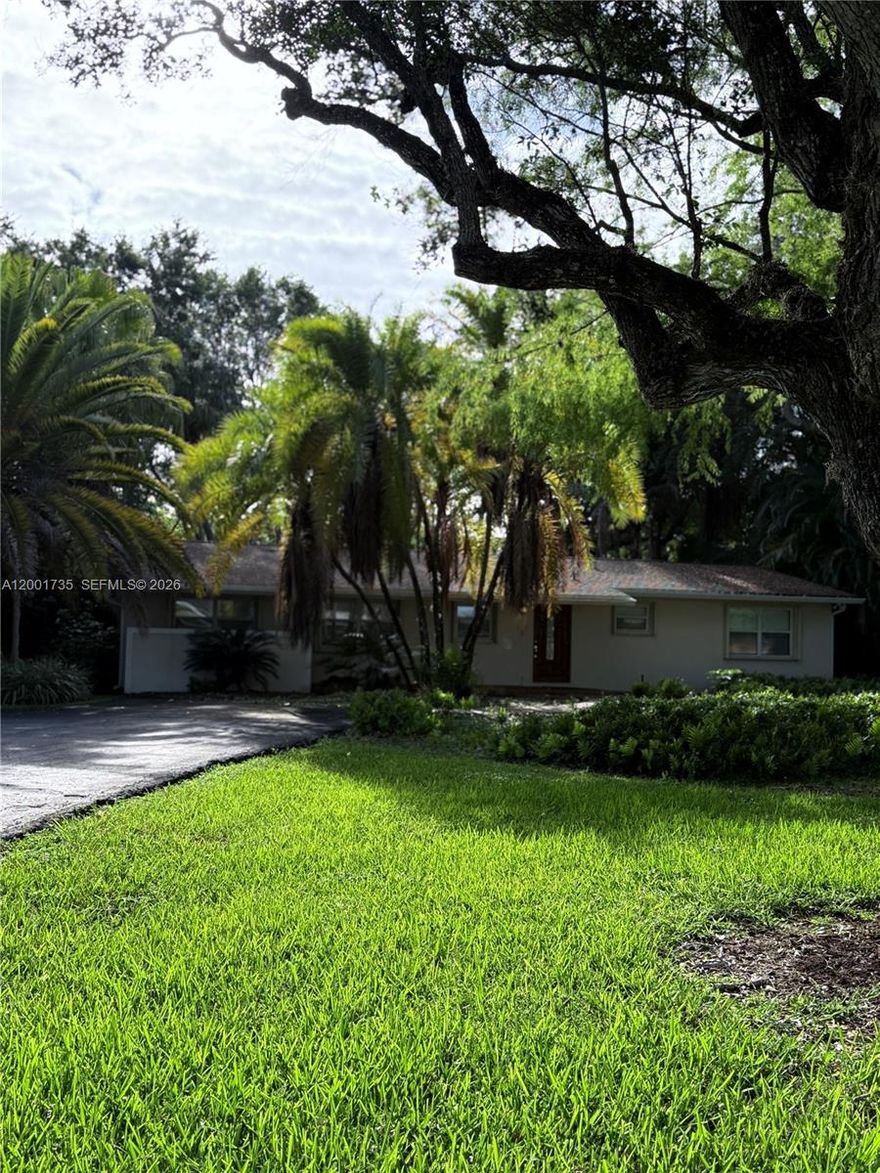 Set on an expansive 1.25-acre, this residence perfectly balances luxury and serenity. Featuring a generously sized kitchen that is equipped with a gas cooktop, stainless steel appliances, and abundant counter space, this home is ideal for both everyday living and entertaining. Elegant French doors lead into a bright and airy living area which offers an abundance of natural light. Step outside to your personal oasis, where a screened-in pool and heated jacuzzi provide the perfect setting to relax and unwind in complete privacy. Lush, mature landscaping surrounds the property, offering a tranquil, secluded atmosphere. Property incudes a detached 4-car garage, complete with an attached 1 bedroom apartment. Ideally located, this home offers convenient access to top-rated schools, premier shopping, dining, and major highways.