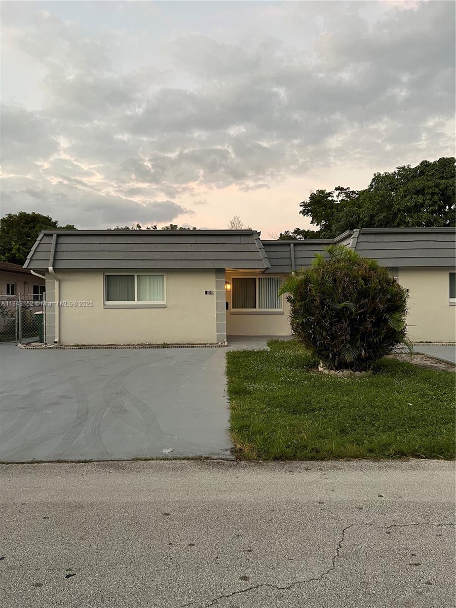 Renovated 2BR/2BA duplex featuring tile floors, granite countertops, fresh paint, and a fully fenced yard. No HOA approval—fast move-in!