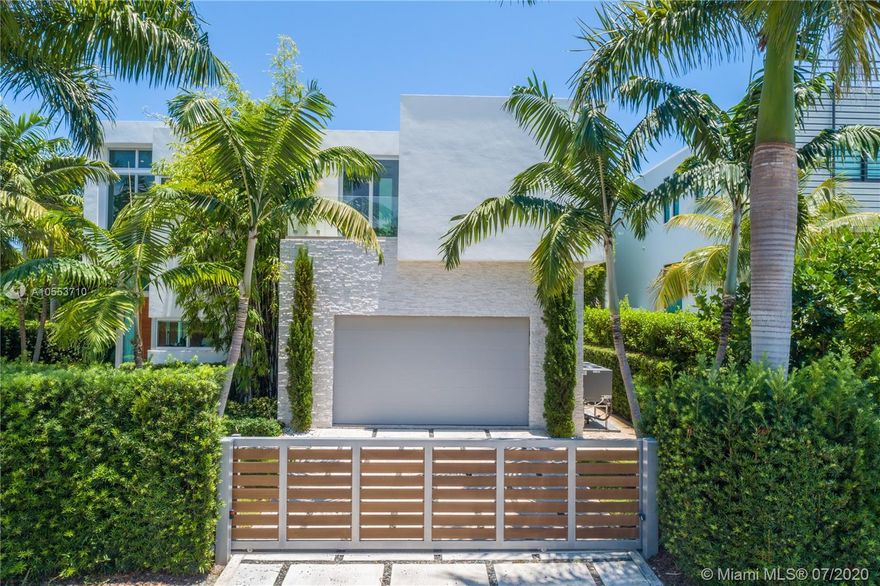 Income producing Hibiscus Island Miami Beach home with $26,000 month paying tenant. Lushly landscaped and strikingly modern two-level turnkey residence located in Hibiscus Island on a prime 9,500 sf corner lot. Combining functionality and design, it has an adj. area of 4.090 sf., 5 beds and 5.5 baths with glass walls that overlook the resort-inspired backyard. This tropical oasis features an inviting pool, fire pit, grill and lounging areas. Upstairs is the clean-lined master bedroom with 2 walk-in closets and spa-like bath, two guest bedrooms and a bedroom converted into a fitness room. Highlights include an open kitchen with upright wine cooler, office, two-car garage, rooftop terrace and more.