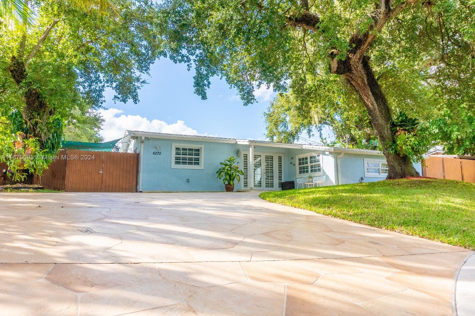 Gorgeous 3-bedroom, 2-bathroom home VERY WELL LOCATED in the heart of Hollywood, Florida. This beautifully updated property features elegant porcelain floors, an open-concept kitchen with premium natural quartz countertops, and a completely updated pool with a spacious outdoor area perfect for entertaining with a built-in barbeque, grill kitchen, and sink. Also, this property includes a built-in security system and a garden irrigation system. The home has been meticulously maintained by the current owners and is in stunning condition.
Don't miss out on this incredible opportunity. Easy to show!