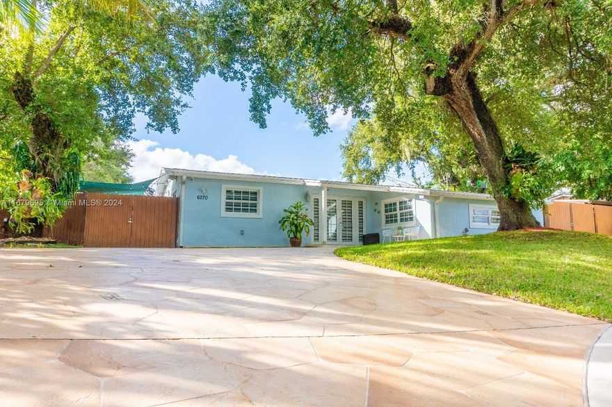 Gorgeous 3-bedroom, 2-bathroom home VERY WELL LOCATED in the heart of Hollywood, Florida. This beautifully updated property features elegant porcelain floors, an open-concept kitchen with premium natural quartz countertops, and a completely updated pool with a spacious outdoor area perfect for entertaining with a built-in barbeque, grill kitchen, and sink. Also, this property includes a built-in security system and a garden irrigation system. The home has been meticulously maintained by the current owners and is in stunning condition. 

Don't miss out on this incredible opportunity. Easy to show!