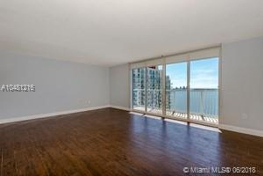 Amazing corner unit with unobstructed bay view.  Enjoy the Sunrise and the city lights.  This impeccable residence has been recently painted, and has new floors.  The apartment has eastern and southern exposure enhancing the best of the city.  Walk to shops, restaurants, banks, gyms, nightlife, and  to the bridges that connect to Key Biscayne and Brickell Key.  Location, views and much more in this full service building with valet, concierge, security, 2 pools, fitness center.