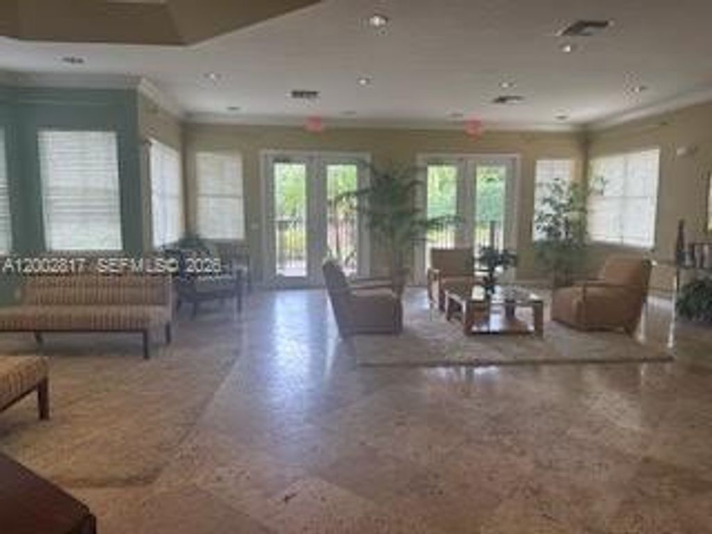 Photo of 10318 Fox Trail Road #411, Royal Palm Beach, FL 33411 (MLS # A12002817)