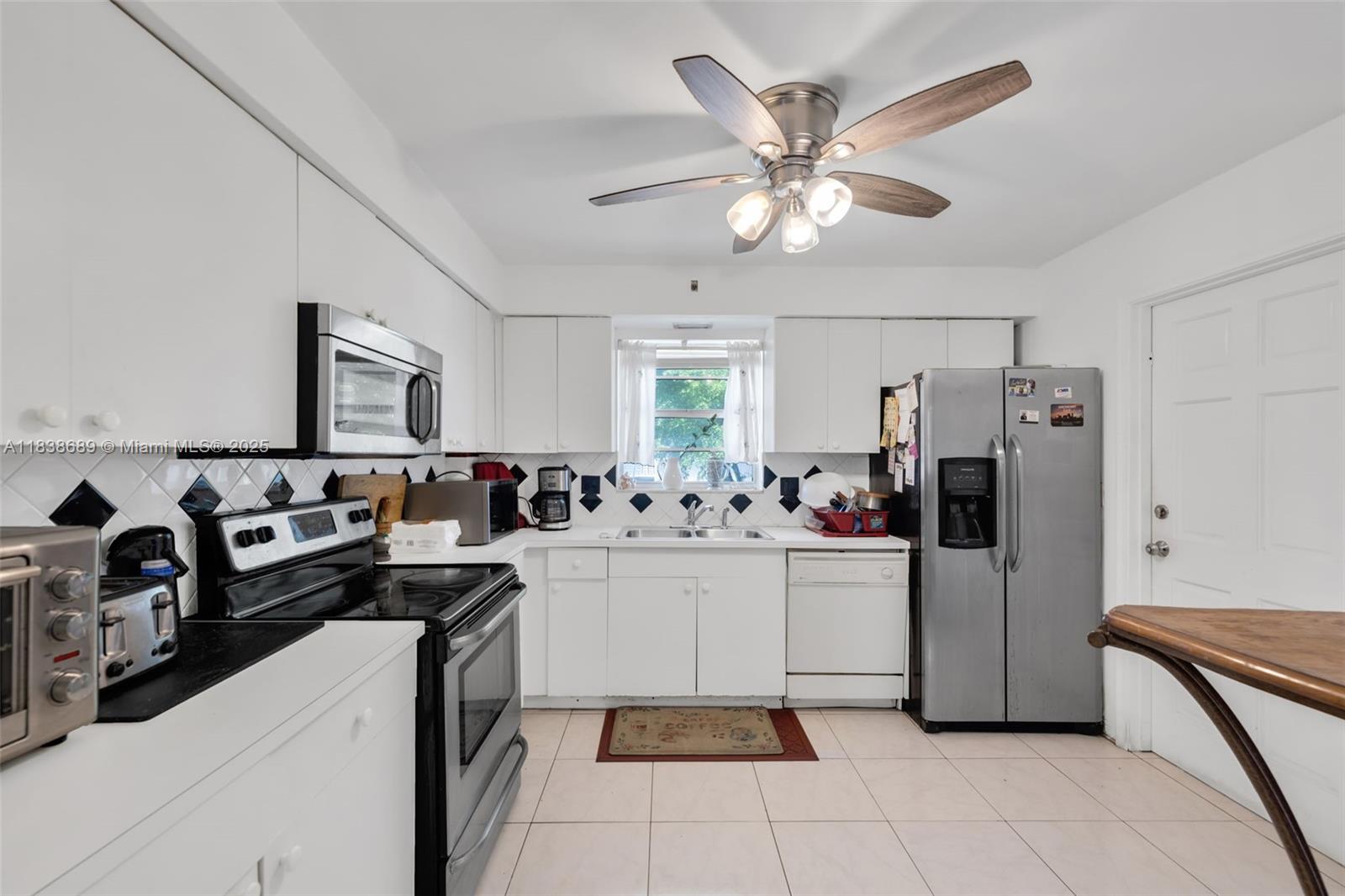 Charming and spacious 2-bed, 2-bath condo in a well-maintained 55+ community in the heart of Hollywood. With approx. This 2nd floor unit offers a bright kitchen with generous cabinet space and a window over the sink, plus a large living room filled with natural light. The primary suite features a walk-in closet and private bath with stand-up shower. Tile flooring throughout, a new water heater, one hallway closet, and a private storage unit in the onsite laundry facility. Elevator-equipped building with a new roof (2025), fully paid by seller. Well-kept and move-in ready. Enjoy peaceful living just minutes from downtown, shopping, dining, golf, and beaches. Ideal for those seeking comfort, convenience, and a welcoming 55+ community to call home.