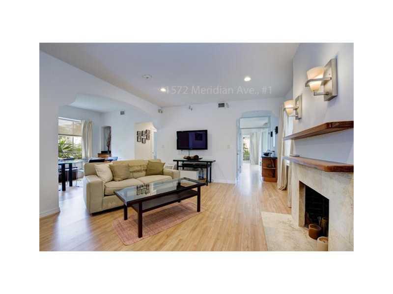 Furnished 2 bedroom 2 bath nestled in a lush tropical courtyard. This charming apt has high ceilings w/ recess lighting, surround sound, flat screen TV, fireplace, upscale kitchen w/ gas range & SS appliances. This kitchen has every tool a cook could des ire. Hard wood floors, master bedroom has a wonderful walk-in closet. Both baths are finished w/ marble & contemporary fixtures. But the best part is the windows that stream rays of sunshine. Steps to world famous Lincoln Rd. Courtyard has BBQ area.