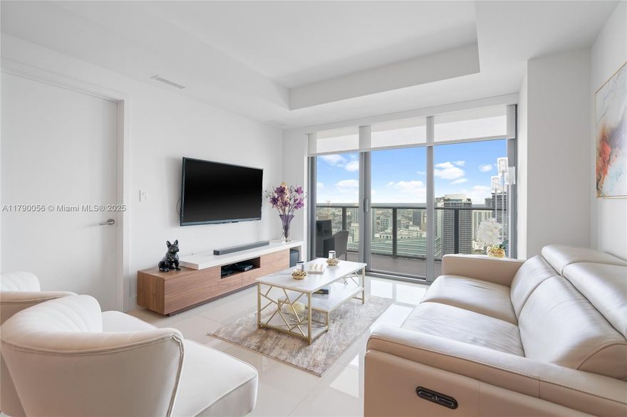 Discover luxury living in Brickell's sought-after DUA Brickell Residences. This beautiful and spacious corner unit boasts 2 beds, 2 baths, plus a den. Enjoy breathtaking water and city views from your wraparound balcony. The European kitchen is fully equipped with top-of-the-line appliances. The tile floors add a touch of elegance and class. Take advantage of the incredible amenities and prime location, just steps from fine restaurants, banks, shops, and more. This is the perfect place to call home!
