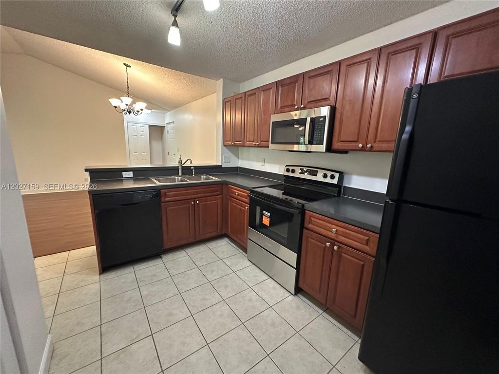 Photo of 10161 W Sunrise Boulevard #305, Plantation, FL 33322 (MLS # A12027159)