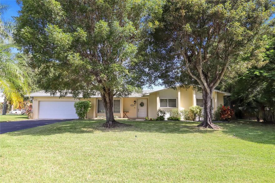 Don't miss out on this opportunity in desirable Cutler Bay! This spacious home sits on an oversized corner lot and features four comfortable bedrooms and three bathrooms, providing ample space for family and guests. The inviting, open floor plan is perfect for entertaining and modern living. The expansive yard offers plenty of room to add a pool, while still providing generous space for boat or RV parking. Enjoy the convenience of a two-car garage and the peace of mind offered by the included hurricane shutters. This property is a must-see for anyone seeking space, location, and security.