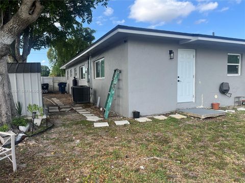 Tiny photo for 6742 SW 18th Ct, North Lauderdale, FL 33068 (MLS # A12010297)