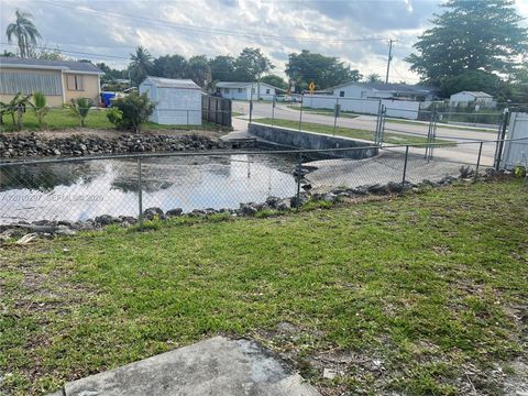 Tiny photo for 6742 SW 18th Ct, North Lauderdale, FL 33068 (MLS # A12010297)