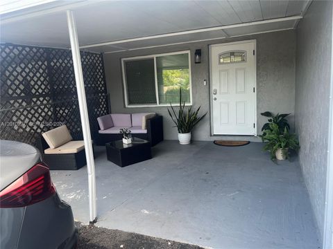Tiny photo for 6742 SW 18th Ct, North Lauderdale, FL 33068 (MLS # A12010297)