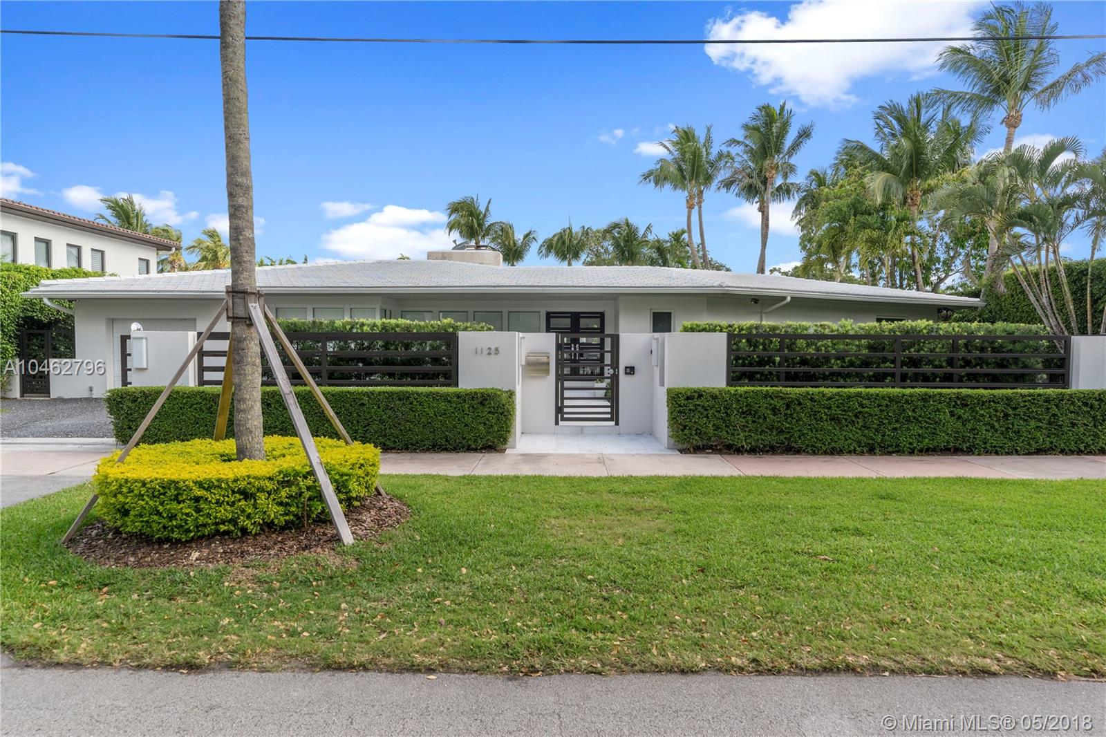 Elegant 3 bedroom/3.5 bathroom home on the Coral Gables Waterway with ocean access. Gated Entry, Family Room, Living Room with fire feature, Gourmet Kitchen with Miele & Sub-Zero appliances, Master Bedroom Suite with sitting area, walk-in closet & views of the pool, deck & Waterway.  Boater&#x2019;s dream home designed for entertaining with heated pool, waterfall, built-in grill, sea wall/dock & RARE covered boat house. State of the art home entertainment & sound system, alarm system, air conditioned garage with built-in-storage & much more.