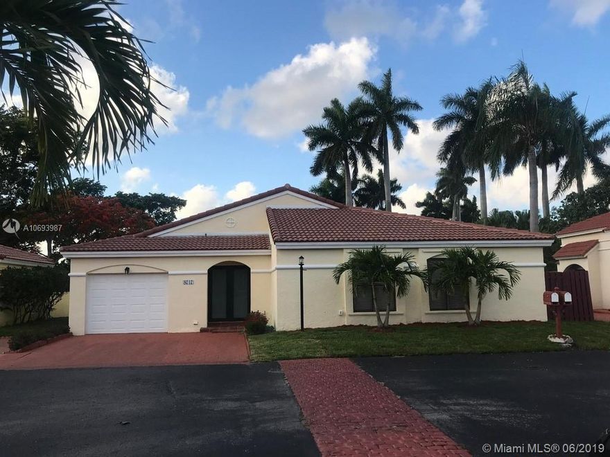 3/2 with 1 car garage with 24 hr security centrally located just of 8th street and 87th avenue with premium lot close proximity to the entrance and exit of the community. Completely updated: New Stainless steel appliances - New Washer and Dryer - New water heater - New window coverings - New Kitchen - New Bathrooms - New tiled outdoor terrace - All new outlets and light fixtures inside and out. - Freshly painted inside and out - New landscaping and sodding with new sprinkler system - Roof is 5 years old Association covers front lawn maintenance. This is a very quiet neighborhood with treeline streets great for morning and afternoon walks. Close to both Palmetto and Turnpike.