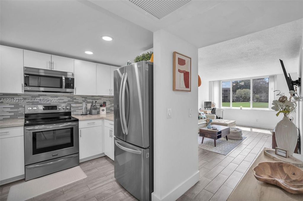 Photo of 9431 Live Oak Pl #108, Davie, FL 33324 (MLS # A12012319)