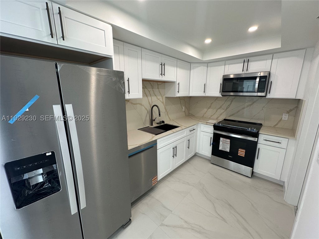 Photo of 6797 Willow Wood Dr #6043, Boca Raton, FL 33434 (MLS # A11929230)