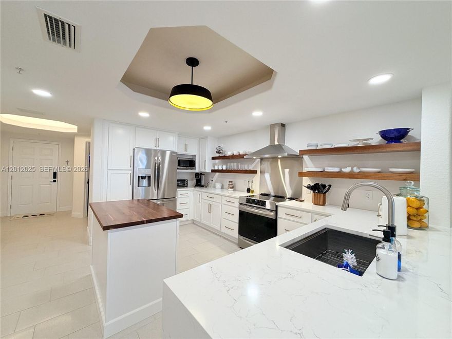 Welcome to your dream oceanfront lifestyle! Units in the highly sought-after Seaport Oceanfront community rarely hit the market — and this one is SPECIAL. This completely remodeled 3-bedroom, 2-bathroom condo was beautifully reimagined in 2022, featuring all-new appliances, stunning finishes, a brand new wet bar, a full-house water filter, and a completely reconfigured primary bathroom that is sure to impress. Truly move-in ready!

Step outside and you are IMMEDIATELY on the sand — private, gated beach access is just steps away. Cool off in one of the multiple resort-style pools, challenge a friend on the tennis courts, or break a sweat in the fully equipped clubhouse gym. This is resort living every single day.

Your very own garage is conveniently located on the perimeter of the building — drive right up and unload with ease. Plus, plenty of guest parking available for when friends and family come to visit!

Situated just minutes from world-famous Kennedy Space Center, incredible dining, shopping, and a quick drive to Orlando, the location simply cannot be beat. And the best part? Watch breathtaking space launches right from the beach or from your own private balcony.

Get ready for summer in your new move-in ready home. Opportunities like this do not come around often. Do not wait — this one will not last! For Open House, call agent for access.