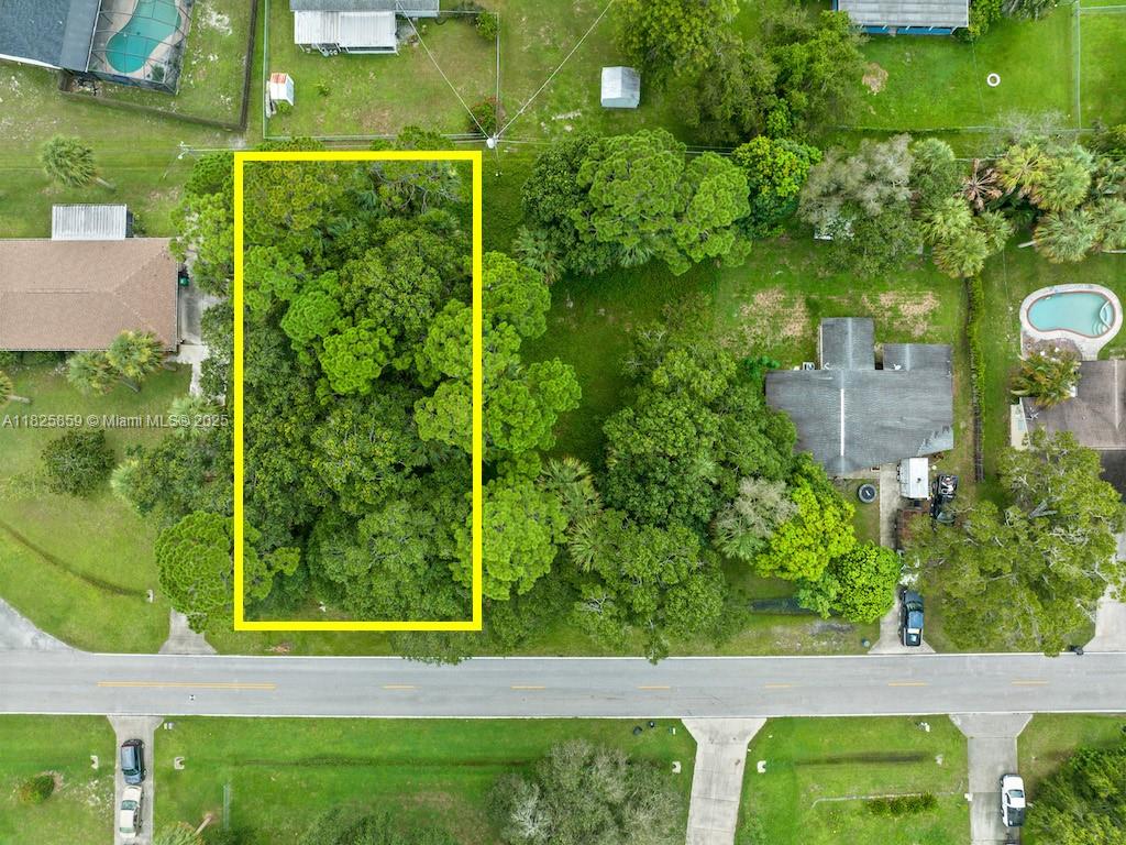 Adjacent lot available! This lot can be purchased together with 7101 Sebastian Rd. Gorgeous mature trees, quiet street and NO restrictions-this is a blank canvas for your future home and large yard for toys and pets. Sizes are approx/subj to error.