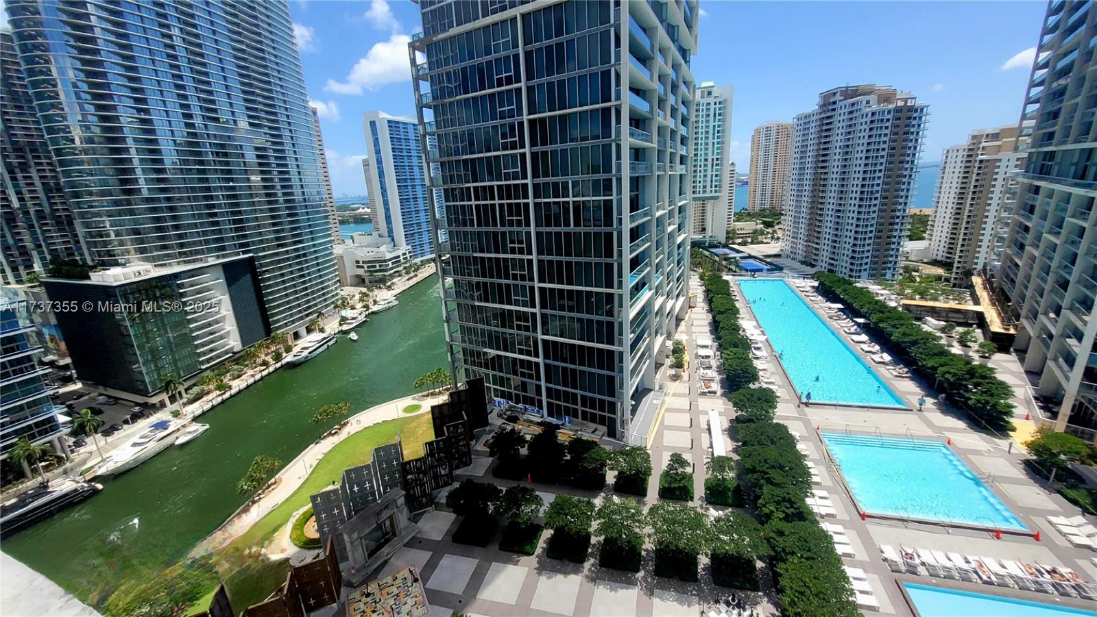 Discover the best breathtaking water views Airbnb no restrictions. Furnished 1 Bed/1Bath gem spans 876 sf. Overlooking the pool, Miami River, Downtown Miami and the Biscayne Bay, its kitchen and walk-in closet, , full-size washer/dryer, Italian cabinets, premium appliances by Wolf & Subzero and Bosch. boasting stunning east-facing views of the bay, pool, and Brickell Key. Wake up to breathtaking sunrises and bask in natural light throughout. Short-term rentals permitted, designed by Philippe Stark, is a resort-style gem in Brickell. Enjoy the 28,000sf spa, fitness center, and the 300-ft infinity pool overlooking the Bay. Live here full time or make money!