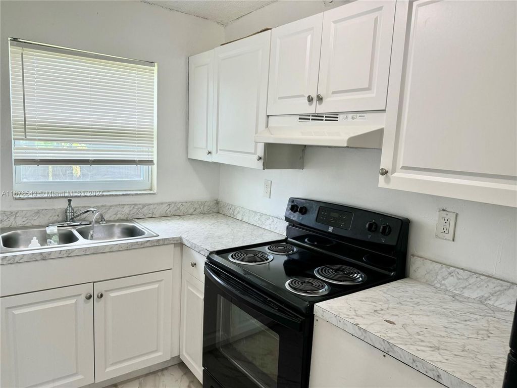 Photo of 2410 NW 14th St #1-2, Fort Lauderdale, FL 33311 (MLS # A11678543)