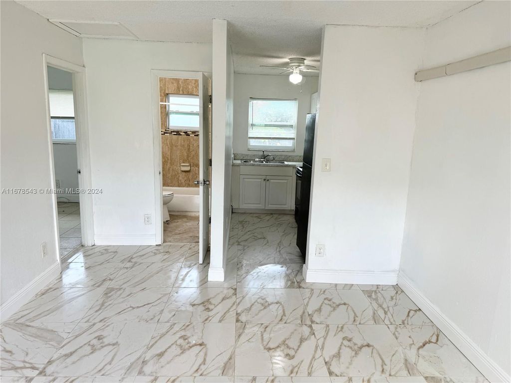 Photo of 2410 NW 14th St #1-2, Fort Lauderdale, FL 33311 (MLS # A11678543)