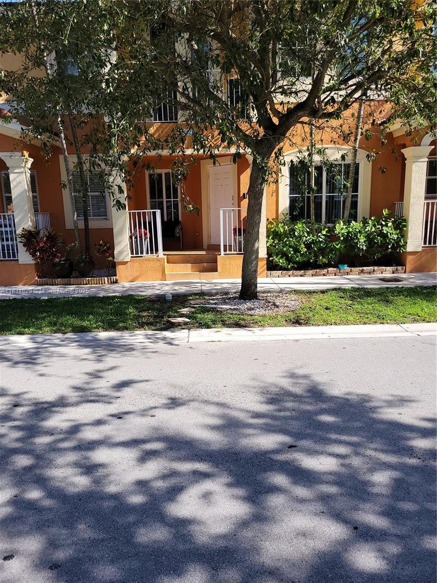 OWNER VERY MOTIVATED. HUGE PRICE REDUCTION.  Well-maintained townhouse in family-oriented, fast-growing South Dade neighborhood. Owner's pride is obvious the moment you step in. Soft accent wall decor, combination of laminate and tile flooring, stained wood staircase, sparkling bathrooms, bright and airy atmosphere to a cozy and welcoming backyard patio ideal for relaxation and entertainment  Complimenting this breathtaking unit: upgraded granite countertops in the kitchen, recently installed impact windows, new AC unit, ring doorbell and Vivint alarm security system, wood kitchen cabinets, walk - in closet, and separate dining area. The property also has a water view from across the road. Seeing is actually believing. To appreciate all the features, make this stop a MUST while house hunting.