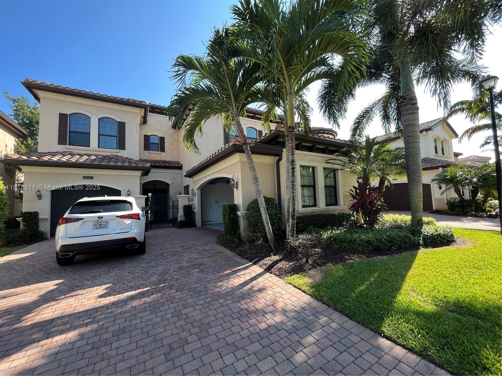 Incredible estate home in the perfect Boca/Delray location! This stunning 2-story residence offers 5 beds, 6.5 baths, a den, playroom, and over 6,000 total sqft. Enjoy a gourmet European-style kitchen, grand master suite with separate his & hers baths and walk-in closets, plus a first-floor bedroom with en-suite bath. Laminate flooring on stairs and all upstairs. South-facing covered patio overlooks the pool and lake. Dual garages. Located in a guard-gated community with restaurant, tennis, gym, playground, covered basketball court & more. Currently rented for $10,300/month until 10/25. Showings require proof of funds and advance notice.