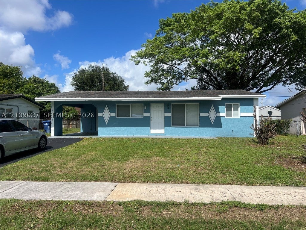 Photo of 3571 NW 7th Ct, Lauderhill, FL 33311 (MLS # A12109087)