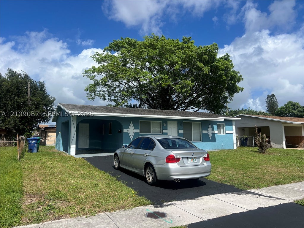 Photo of 3571 NW 7th Ct, Lauderhill, FL 33311 (MLS # A12109087)