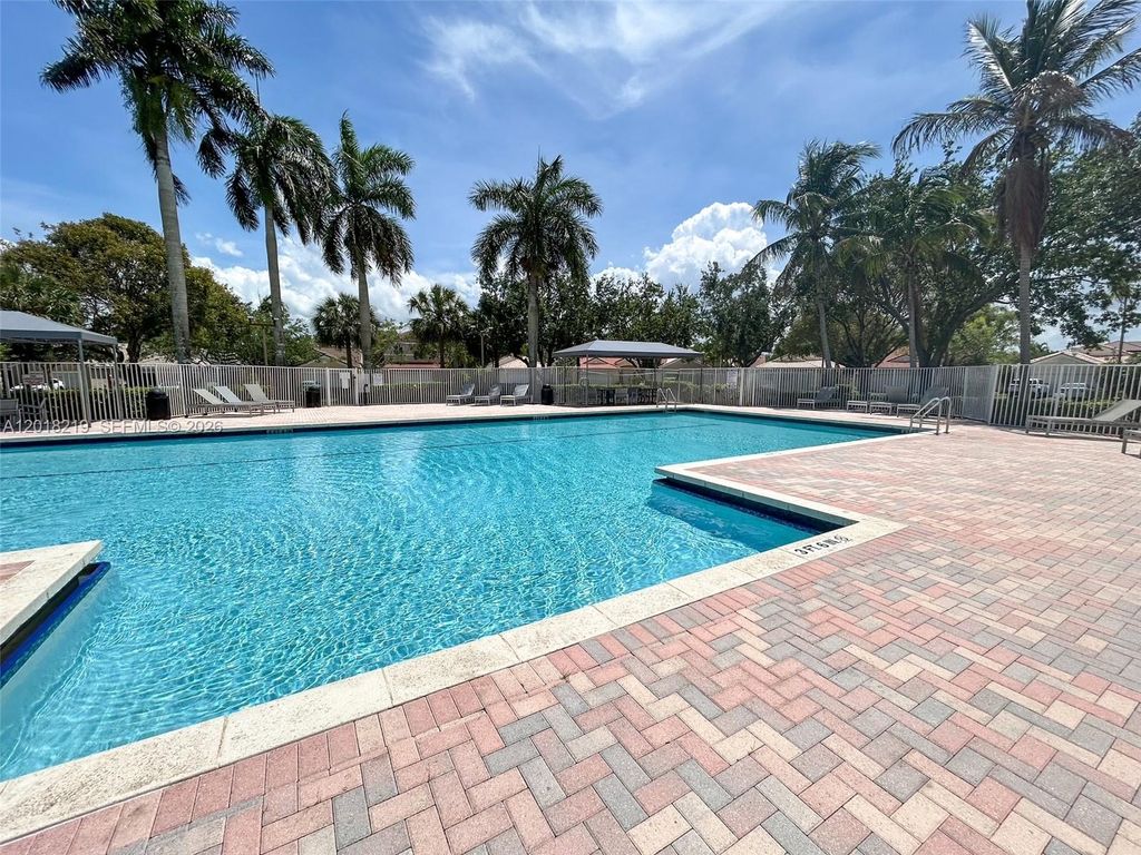 Photo of 2042 Madeira Dr, Weston, FL 33327 (MLS # A12018219)