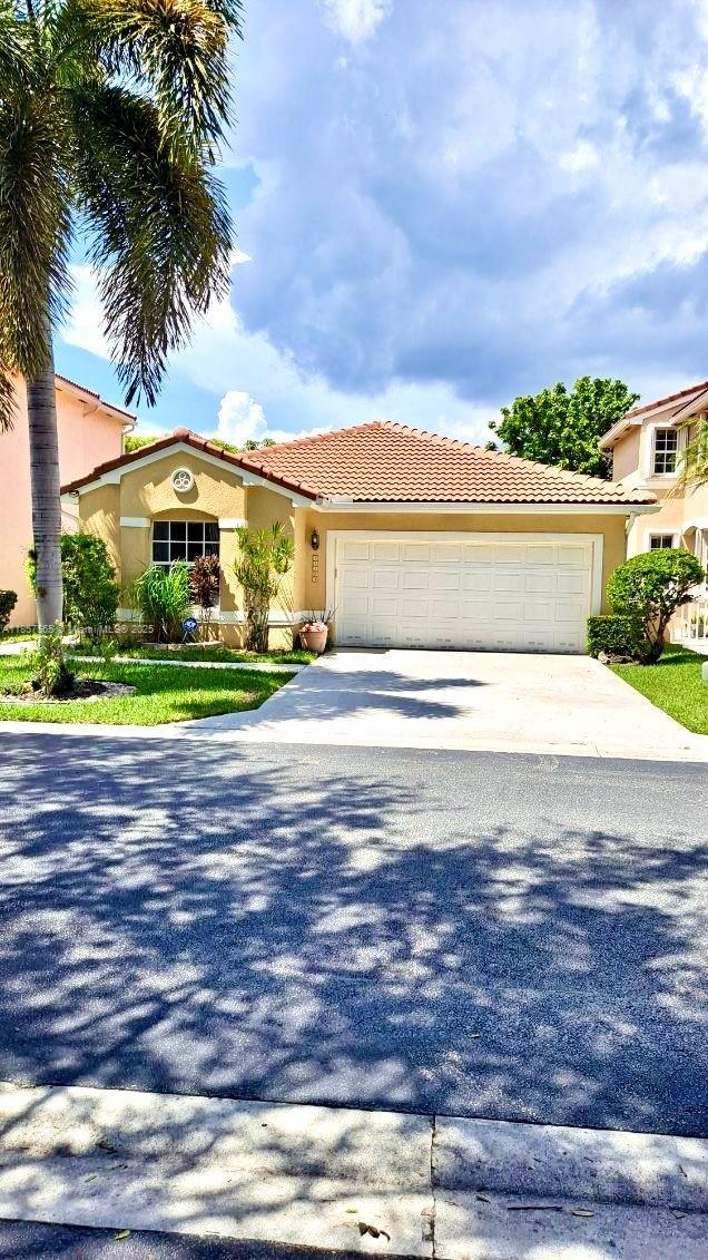 BEST WATERFRONT DEAL IN BROWARD OR DADE COUNTY!! AMAZING PRICE FOR HOME BUILT IN 1997 WITH HIGH CEIILING, PRICELESS WATER VIEWS, HUGE GARAGE, IN EXCELLENT COMMUNITY IN EXCELLENT AREA NEAR ANYTHING YOU NEED INCLUDING TOP SCHOOLS IN AMERICA. $40,000 TILE ROOF ONLY 3 YEARS OLD, ALMOST ALL THE PLUMBING HAS BEEN UPDATED IN RECENT YEARS, HURRICANE SHUTTERS, WATER SOFTNER SYSTEM, FENCE FOR THE YARD...THIS IS A STEAL. EASY TO VIEW WILL NOT LAST!!
